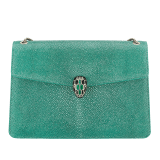 “Serpenti Forever” shoulder bag in emerald green galuchat skin. Iconic snake head closure in light gold plated brass enriched with black enamel, malachite scales and black onyx eyes. 289026 image 1