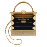 “Serpenti Forever ” crossbody bag in daisy topaz full galuchat skin body and daisy topaz calf leather sides. Iconic snakehead closure in light gold plated brass enriched with black and white enamel and black onyx eyes. 752-FG image 4