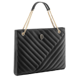 Serpenti Cabochon tote bag in soft matelassé black nappa leather with graphic motif and black calf leather. Snakehead decòr in rose gold plated brass embellished with matte black and shiny black enamel, and black onyx eyes. 990-NSM image 2