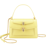 Alexander Wang x Bulgari small belt bag in sunbeam citrine calf leather with black nappa leather lining. Captivating double Serpenti head closure in antique gold-plated brass embellished with red enamel eyes. 291889 image 1