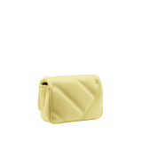 Serpenti Cabochon micro bag in ivory opal calf leather with a maxi matelassé pattern and black nappa leather lining. Captivating snakehead closure in gold-plated brass embellished with red enamel eyes. SCB-NANOCABOCHON image 3