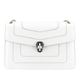 Serpenti Forever medium shoulder bag in black calf leather with emerald green grosgrain lining. Captivating snakehead closure in light gold-plated brass embellished with black and white agate enamel scales and green malachite eyes. 1089-Cla image 1