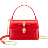 "Alexander Wang x Bvlgari" belt bag in smooth Amaranth Garnet red calfskin. New double Serpenti head closure in antique gold-plated brass with alluring red enamel eyes. 291170 image 1