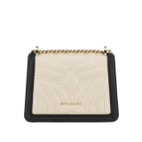 “Serpenti Diamond Blast” crossbody bag in Ivory Opal white quilted nappa leather body, featuring a maxi matelassé pattern, and black calf leather frames, with black nappa leather internal lining. Tempting snakehead closure in light gold plated brass enriched with black enamel and black onyx eyes. 1063-MFQD image 3