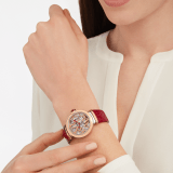 LVCEA Skeleton watch with mechanical manufacture movement, automatic winding and skeleton execution, polished stainless steel case, 18 kt rose gold bezel, openwork BVLGARI logo dial and links, and red alligator bracelet. Water-resistant up to 50 metres. 103373 image 4