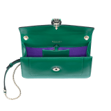 “Serpenti Forever” crossbody bag in agate-white calfskin with Heather Amethyst purple grosgrain inner lining. Iconic snakehead closure in light gold-plated brass embellished with black and agate-white enamel and green malachite eyes 625-CLa image 4