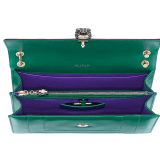 Serpenti Forever medium shoulder bag in black calf leather with emerald green grosgrain lining. Captivating snakehead closure in light gold-plated brass embellished with black and white agate enamel scales and green malachite eyes. 1089-Cla image 3