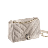 Serpenti Cabochon small shoulder bag in milky opal beige matelassé metallic karung skin with milky opal beige nappa leather lining. Captivating snakehead closure in light gold-plated brass embellished with matt black and glitter milky opal beige enamel scales and black onyx eyes. 1094-MK image 2