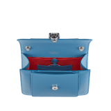 Serpenti Forever small crossbody bag in Niagara sapphire blue calf leather with silky coral pink grosgrain lining. Captivating snakehead closure in palladium-plated brass, embellished with black and Niagara sapphire blue enamel scales and black onyx eyes. 1184-CL image 5