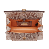 Serpenti Forever Maxi Chain medium crossbody bag in coral carnelian orange Mystical python skin with coral carnelian orange nappa leather lining. Captivating snakehead closure in rose gold-plated brass embellished with mother-of-pearl scales and red enamel eyes. MC-MP-CC image 5