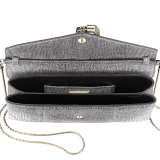 Serpenti evening clutch in milky opal metallic karung skin. Snakehead stud closure with tassel in light gold plated brass and top decorated with black and glitter milky opal enamel, and black onyx eyes. 526-001-0817S-MK image 4