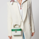 Casablanca x Bulgari small jewelry box bag in white Tennis Groundstroke perforated calf leather with smooth tennis green calf leather inserts and tennis green nappa leather lining. Captivating snakehead zip pullers in gold-plated brass embellished with dégradé green and bright white enamel scales, and green malachite eyes. 292332 image 6