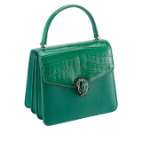 Serpenti Forever crossbody bag in sea star coral shiny croco skin and smooth calf leather. Snakehead closure in light gold plated brass decorated with black and white enamel, and green malachite eyes. 752-CLCR image 2