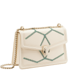 Serpenti Diamond Blast small shoulder bag in ivory opal calf leather with twisted chain and leather décor, and Niagara sapphire blue nappa leather lining. Captivating snakehead closure in light gold-plated brass embellished with matt and shiny ivory opal enamel scales and black onyx eyes. 291725 image 2