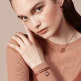 "Serpenti Forever" bracelet in Blush Quartz pink braided calf leather and light gold plated brass snake body-shaped chain, with the iconic snakehead charm in black and white agate enamel and black enamel eyes. Magnetic clasp closure. SerpBraidChain-WCL-BQ image 2