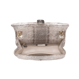 Serpenti Cabochon small shoulder bag in milky opal beige matelassé metallic karung skin with milky opal beige nappa leather lining. Captivating snakehead closure in light gold-plated brass embellished with matt black and glitter milky opal beige enamel scales and black onyx eyes. 1094-MK image 4