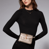 Alexander Wang x Bulgari belt bag in light gold Molten karung skin with black nappa leather lining. Exclusively redesigned double Serpenti head clasp in antique gold-plated brass with seductive red enamel eyes. 291188 image 9