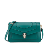 Serpenti Forever East-West small shoulder bag in black calf leather with emerald green gros grain lining. Captivating snakehead magnetic closure in light gold-plated brass embellished with black and white agate enamel scales, and green malachite eyes. 1237-CL image 1