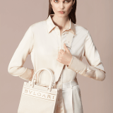 "Bvlgari Logo" small tote bag in Ivory Opal white canvas, with Beet Amethyst purple grosgrain inner lining. Bvlgari logo featured with light gold-plated brass chain inserts on the Ivory Opal white calf leather. BVL-1159-CC image 6