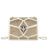 “Serpenti Forever” crossbody bag in black calf leather with a Million Chain motif. Iconic snake head closure in light gold plated brass enriched with black enamel and black onyx eyes. 422-CP image 1