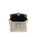 "Serpenti Forever" mini bag in "Molten" gold karung skin and black calfskin, offering a touch of radiance for the Winter Holidays. New Serpenti head closure in gold-plated brass, complete with ruby-red enamel eyes. SERP-BAG-CHARM-MoltK image 2