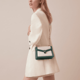 “Serpenti Diamond Blast” crossbody bag in white agate quilted nappa leather and emerald green smooth calf leather frames. Tempting snakehead closure in light gold-plated brass enriched with matte black and shiny emerald green enamel and black onyx eyes. 1063-FQDa image 6