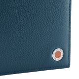 "BVLGARI BVLGARI" hipster compact wallet in denim sapphire soft full grain calf leather and capri turquoise calf leather. Iconic logo decoration in palladium plated brass coloured in capri turquoise enamel. BBM-WLT-HIPST-8C-SFGCL image 4