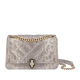 Serpenti Cabochon small shoulder bag in milky opal beige matelassé metallic karung skin with milky opal beige nappa leather lining. Captivating snakehead closure in light gold-plated brass embellished with matt black and glitter milky opal beige enamel scales and black onyx eyes. 1094-MK image 1