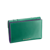 Serpenti Forever large wallet in emerald green calf leather with violet amethyst nappa leather interior. Captivating snakehead press button closure in light gold-plated brass embellished with black and white agate enamel scales and green malachite eyes. 291854 image 3