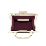 "Bvlgari Logo" small tote bag in Ivory Opal white canvas, with Beet Amethyst purple grosgrain inner lining. Bvlgari logo featured with light gold-plated brass chain inserts on the Ivory Opal white calf leather. BVL-1159-CC image 4