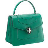 “Serpenti Forever” top handle bag in daisy topaz calf leather. Iconic snake head closure in light gold plated brass enriched with black and white enamel and green malachite eyes. 1050-CL image 2