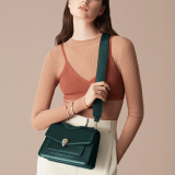 "Serpenti Forever" maxi chain crossbody bag in Ivory Opal white nappa leather, with an Deep Garnet bordeaux nappa leather internal lining. New Serpenti head closure in gold-plated brass, finished with small grey mother-of-pearl scales in the middle, and red enamel eyes. 1138-MCNb image 5