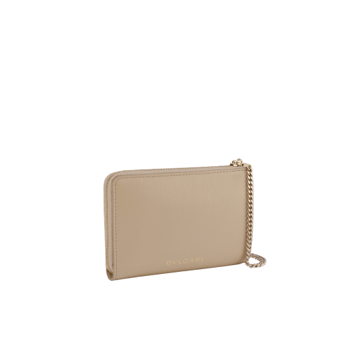 Serpenti Forever zipped card holder in bright travertine ivory calf leather with moonrock light grey and aquamarine nappa leather interior. Captivating snakehead rivet in light gold-plated brass embellished with red enamel eyes. SEA-MC-CCHOLDS image 3