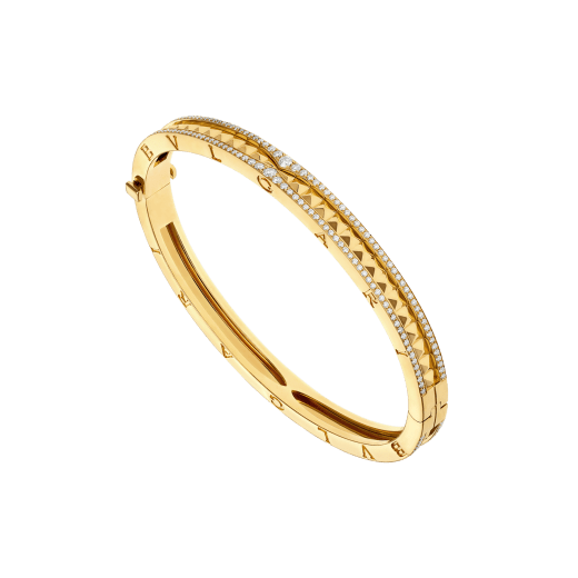 Bracciale B.zero1 Rock in oro giallo 18 kt con pavé di diamanti lungo i lati e spirale con borchie. BR859028 image 1