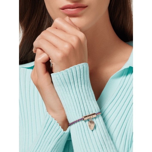 Serpenti Forever bracelet in vivid, dark amethyst purple and gold braided calf leather. Captivating light gold-plated brass snakehead charm embellished with red enamel eyes, attached to the front clasp. SERPHERBRAID-WCL-VA image 2