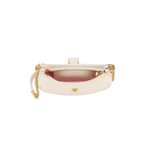 Serpenti Ellipse small crossbody bag in Urban grain and smooth flamingo quartz pink calf leather with flamingo quartz pink gros grain lining. Captivating snakehead closure in gold-plated brass embellished with black onyx scales and red enamel eyes. Online exclusive colour. 1204-UCLa image 4