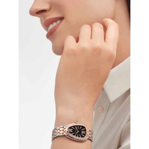 Serpenti Seduttori watch with stainless steel case, 18 kt rose gold bezel set with 38 round brilliant-cut diamonds, black lacquered dial, stainless steel and 18 kt rose gold bracelet with folding buckle. Water-resistant up to 30 meters 103450 image 1