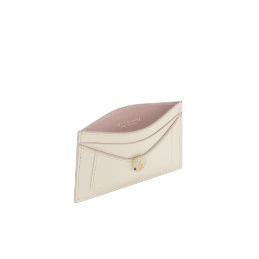 Serpenti Forever card holder in light gold Striated calf leather. Captivating snakehead décor in light gold-plated brass embellished with champagne enamel and light gold-plated brass scales, and black enamel eyes. SEA-CC-HOLDER-R image 2