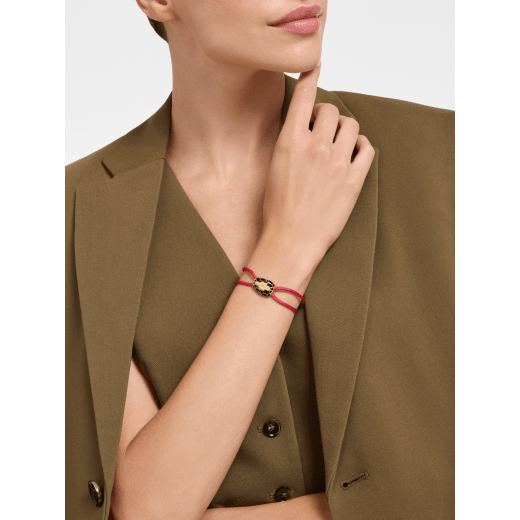 Serpenti Forever bracelet in ruby red fabric. Captivating gold-plated brass snakehead embellishment with black enamel and gold-plated brass scales, and black enamel eyes. 295472 image 1