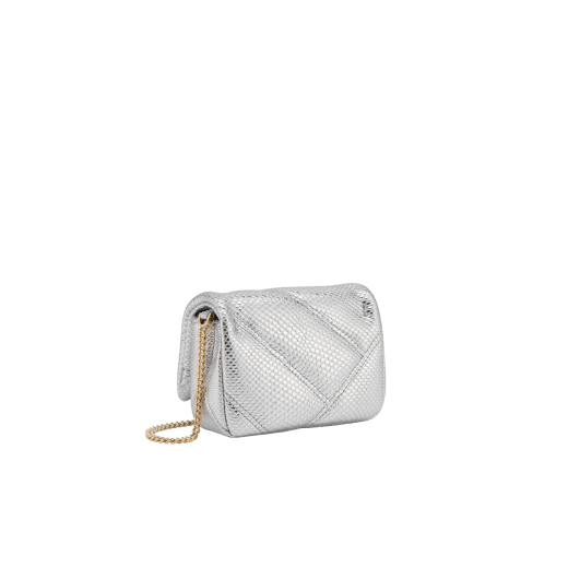 Serpenti Cabochon micro bag in ivory opal calf leather with a maxi matelassé pattern and black nappa leather lining. Captivating snakehead closure in gold-plated brass embellished with red enamel eyes. SCB-NANOCABOCHONa image 3