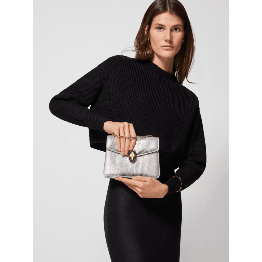 Serpenti Forever small crossbody bag in silver Molten lizard skin with foggy opal grey nappa leather lining. Captivating snakehead magnetic closure in light gold-plated brass embellished with black enamel and light gold-plated brass scales, and black onyx eyes. 293341 image 2