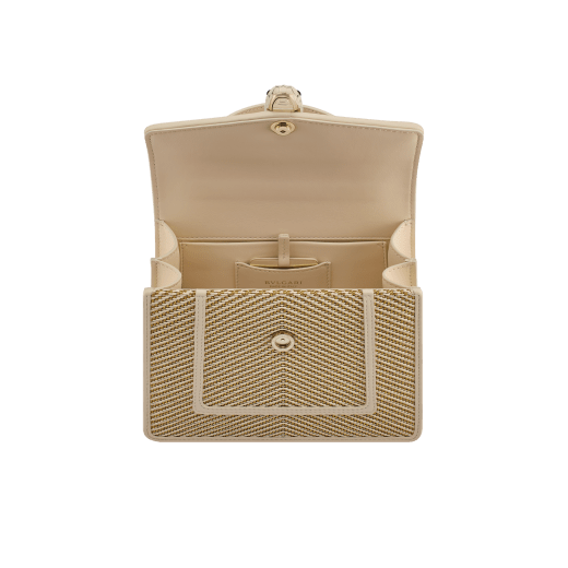 Serpenti Forever medium top handle bag in gold and ivory chévron fabric with ivory nappa leather lining. Captivating snakehead magnetic closure in light gold-plated brass embellished with ivory opal enamel and light gold-plated brass scales, and black onyx eyes. SEA-1282-W image 4
