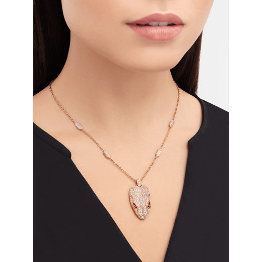 Serpenti necklace in 18 kt rose gold, set with rubellite eyes and with pavé diamonds on the chain and the head. 352725 image 2