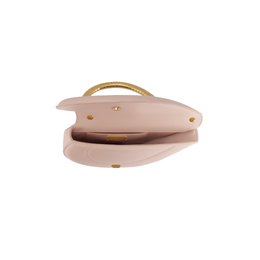Serpenti Cuore 1968 medium top handle bag in star rose pink calf leather with crystal rose nappa leather lining. Captivating snake body-shaped top handle in gold-plated brass embellished with engraved scales and zirconia eyes; press-button closure. 294801 image 4