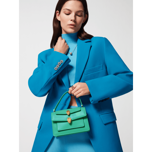 Alexander Wang x Bulgari small belt bag in spring peridot green calf leather with black nappa leather lining. Captivating double Serpenti head closure in antique gold-plated brass embellished with red enamel eyes. 291888 image 5