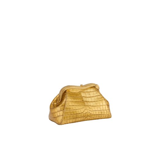 Serpentine small pouch in antique gold soft metallic crocodile skin with 24 kt gold treatment and emerald green nappa leather lining. Captivating snake-shaped frame in gold-plated brass including 3 µ of 24 kt gold, embellished with engraved scales and red enamel eyes on one side and antique gold soft metallic crocodile insert on the other, and press-button closure. Exclusive Bulgari 50th anniversary in the US Edition. 292591 image 6
