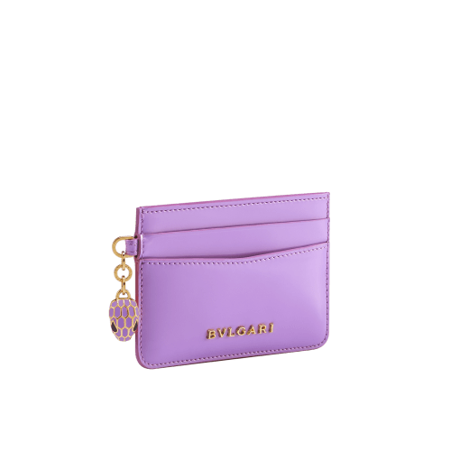 Serpenti Forever card holder in sheer amethyst lilac patent calf leather with black nappa leather lining. Captivating snakehead charm in gold-plated brass embellished with matt sheer amethyst lilac enamel scales and black enamel eyes. SEA-CC-HOLDER-VCL image 1