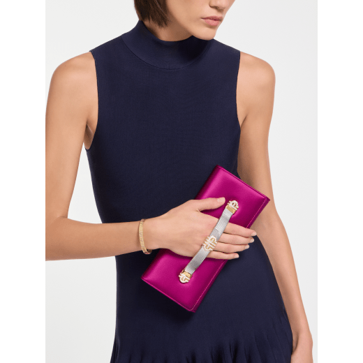 Bvlgari Tubogas evening clutch in black satin with black nappa leather lining. Iconic Tubogas handle in gold-plated brass embellished with zirconia and a magnetic closure. TGC-001-1382S image 1