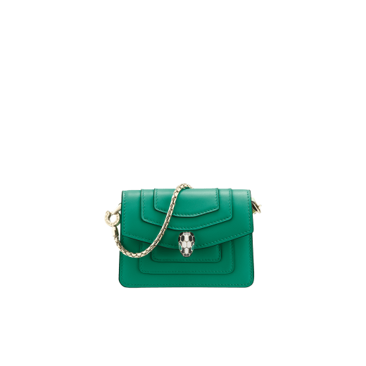 Serpenti Forever miniature bag charm in emerald green calf leather. Captivating snakehead press button closure in light gold-plated brass, embellished with black and white agate enamel scales and emerald green enamel eyes. 283244 image 1