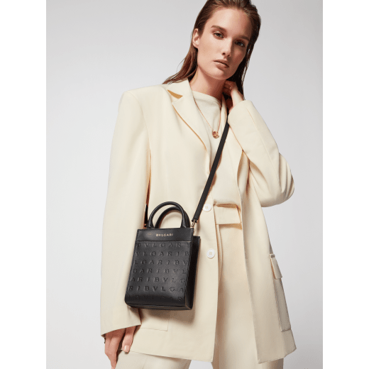 Bulgari Logo mini tote bag in black calf leather with hot-stamped Infinitum pattern and teal topaz green grosgrain lining. Light gold-plated brass hardware. BVL-1228S-ICLa image 2